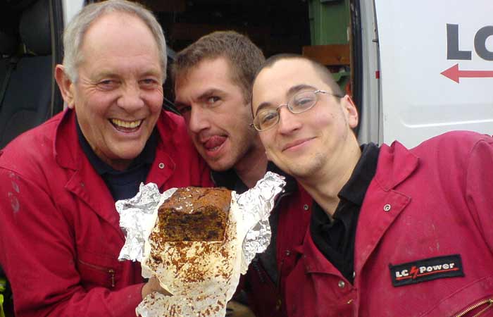 employees enjoy some chocolate cake